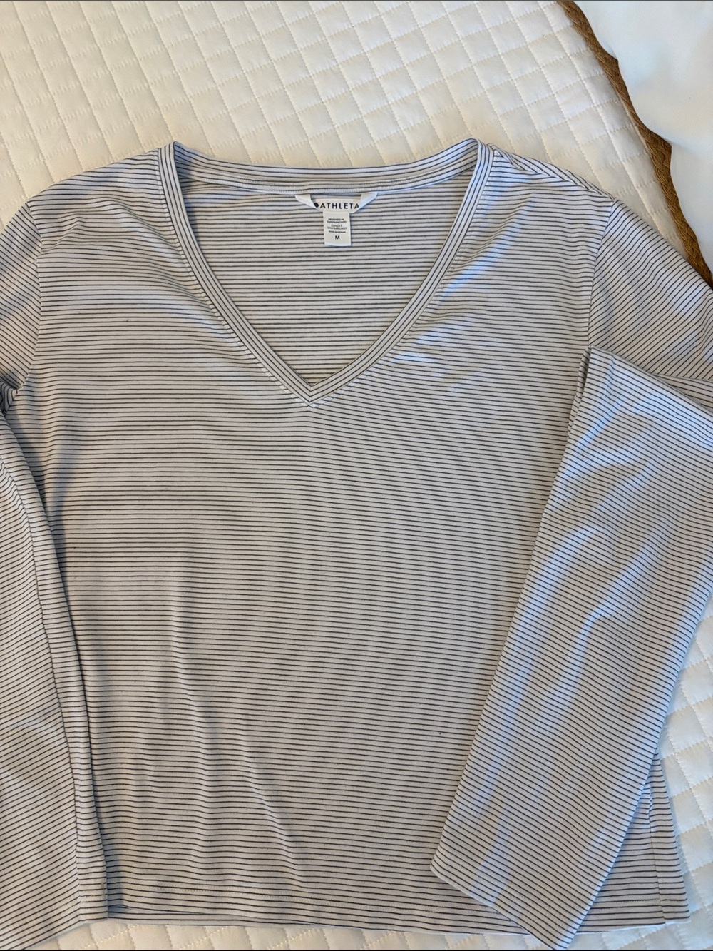 Athleta White Top with Thin Black Stripes V-Neck